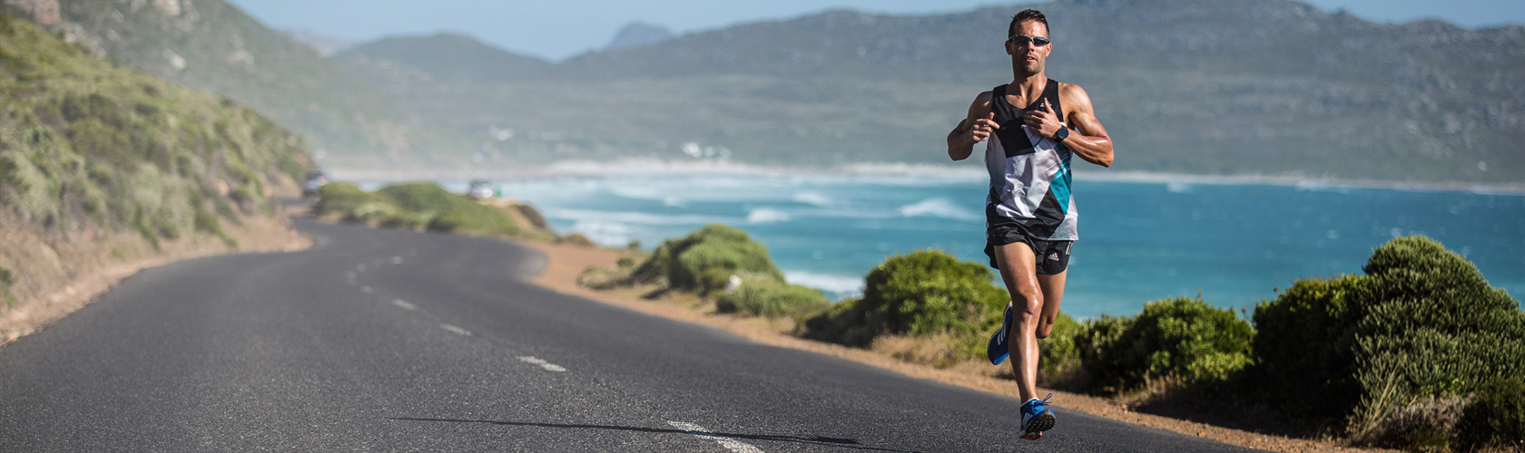Runner running on road